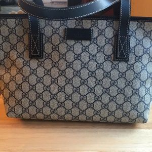 NWOT Gucci Signature bag with leather trim